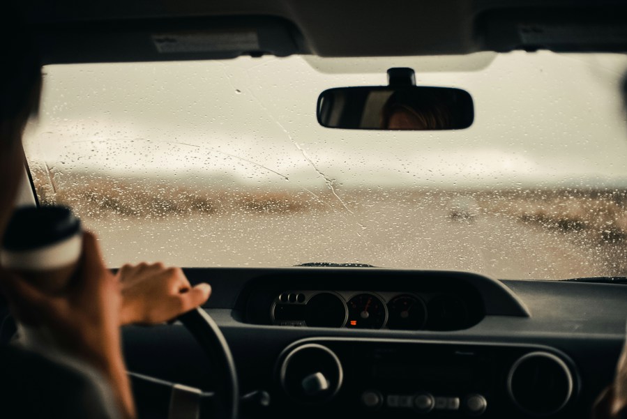 Person driving in the rain